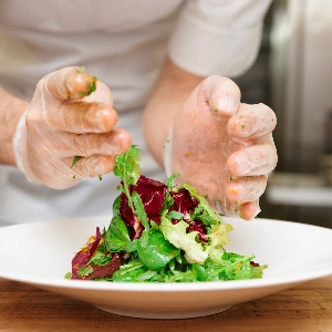 Chef plating salad